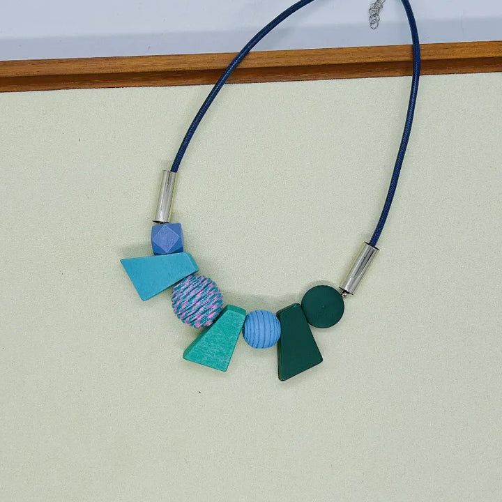 Stylish women's geometric wooden bead necklace. Ethnic handmade jewelry for a natural boho look.