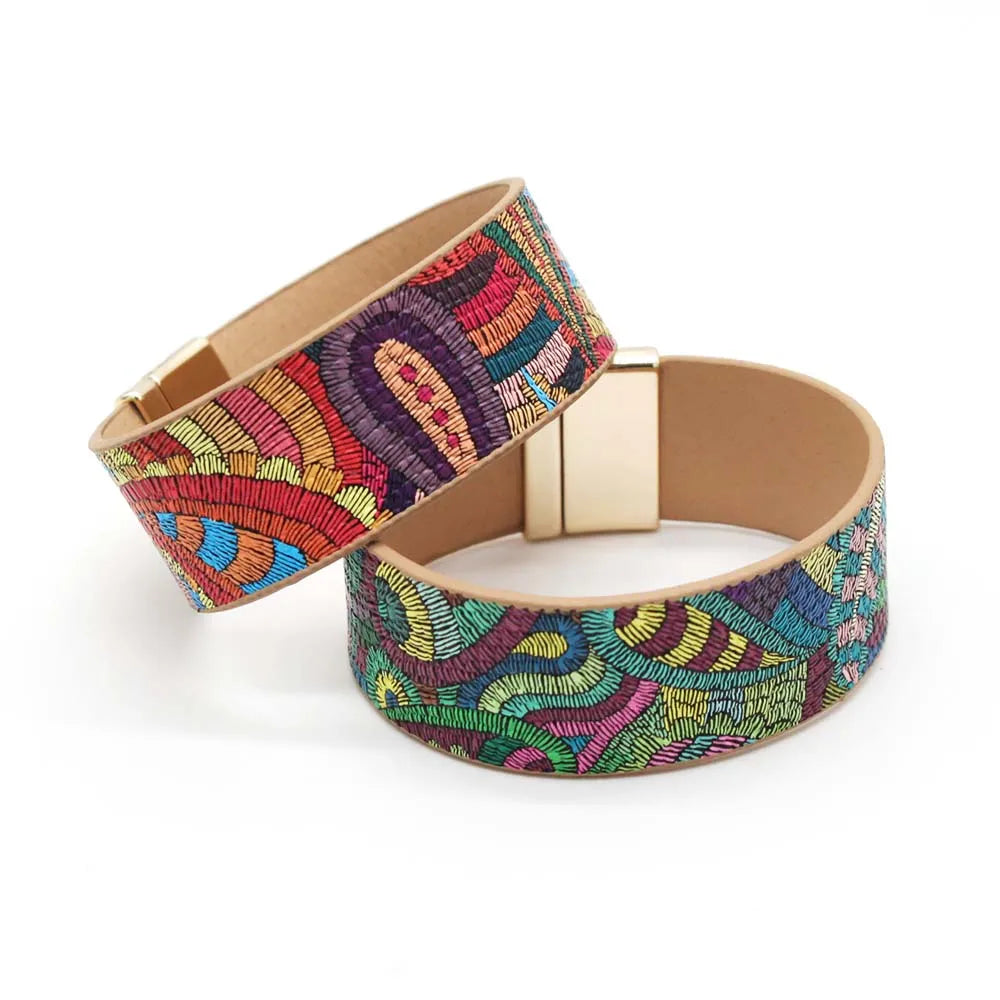 Unique women's ethnic leather wrap bracelet featuring red & green accents, bohemian fashion statement.
