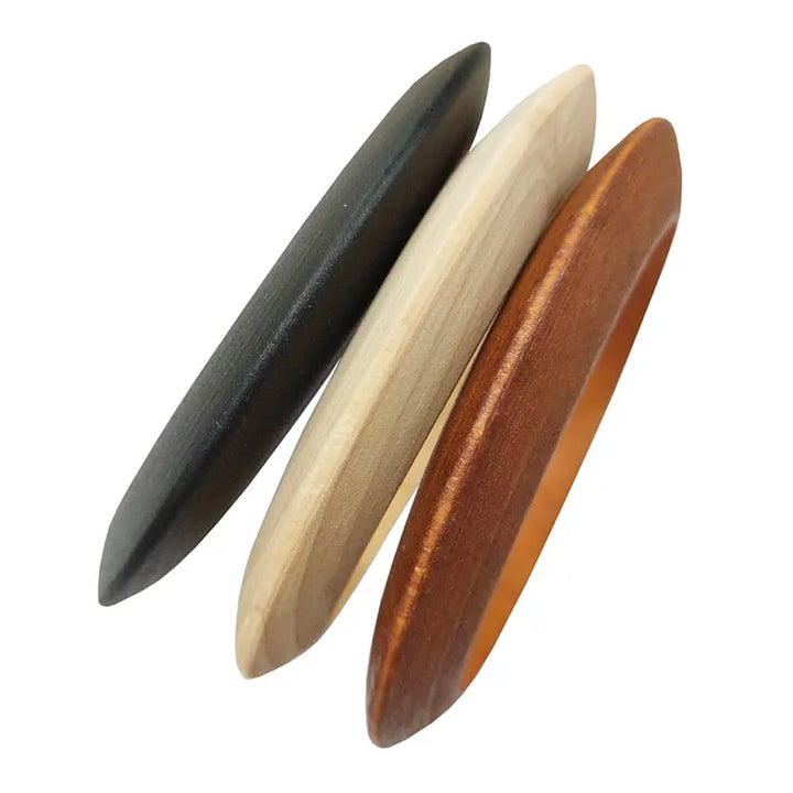 Earthy-toned ethnic wooden bangles for women, a set of natural round wrist accessories with a unique charm.