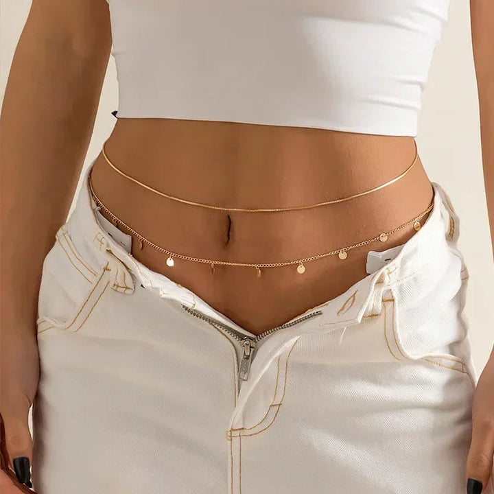 Adjustable double-layer waist chain, a fashionable gold plated body jewelry piece for women.
