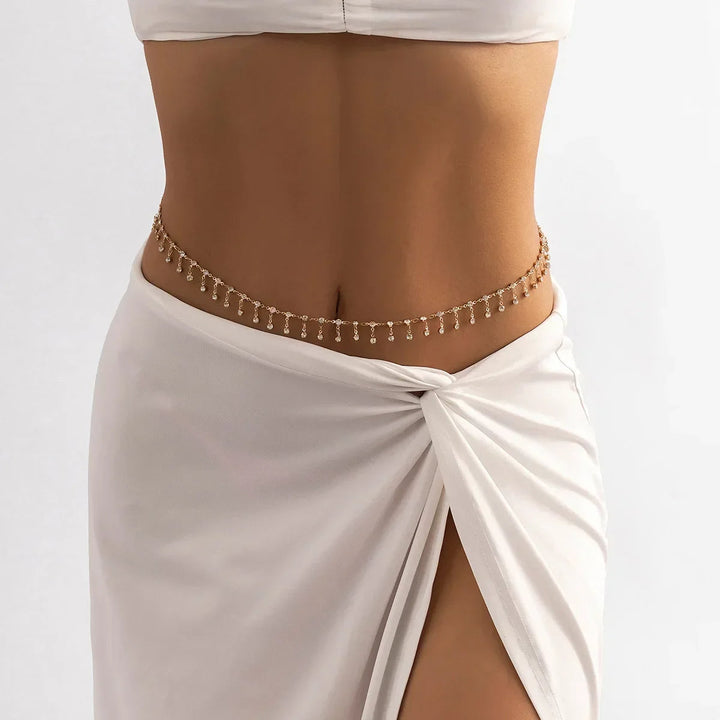 Euphoria crystal layered waist chain, a chic gold plated fashion accessory for boho style outfits.