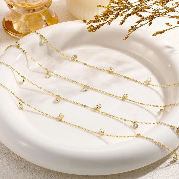 Stunning gold plated double-layer waist chain, featuring crystal embellishments, a trendy boho body jewelry.