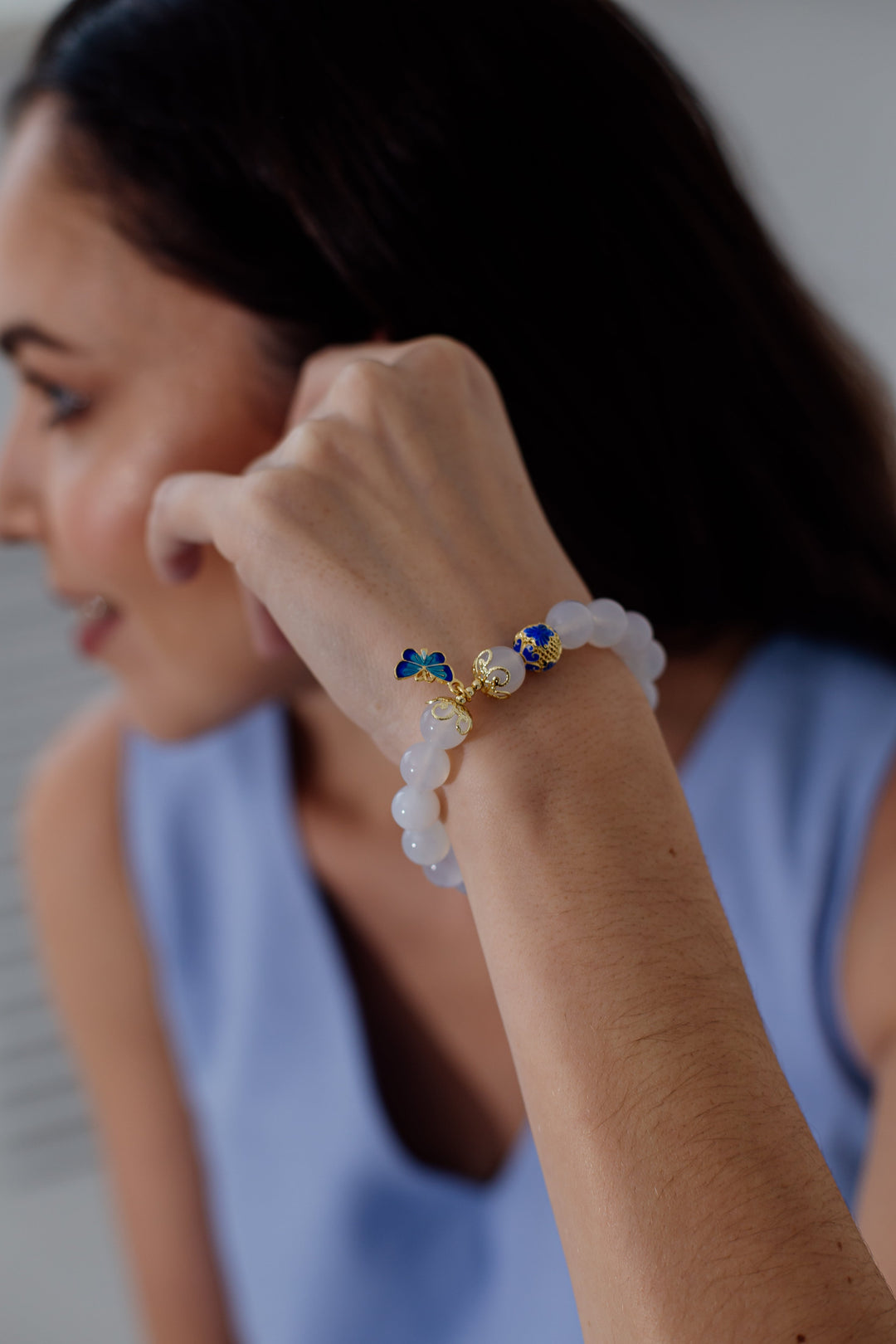 Handmade white agate butterfly bracelet for women, promoting spiritual harmony and protection