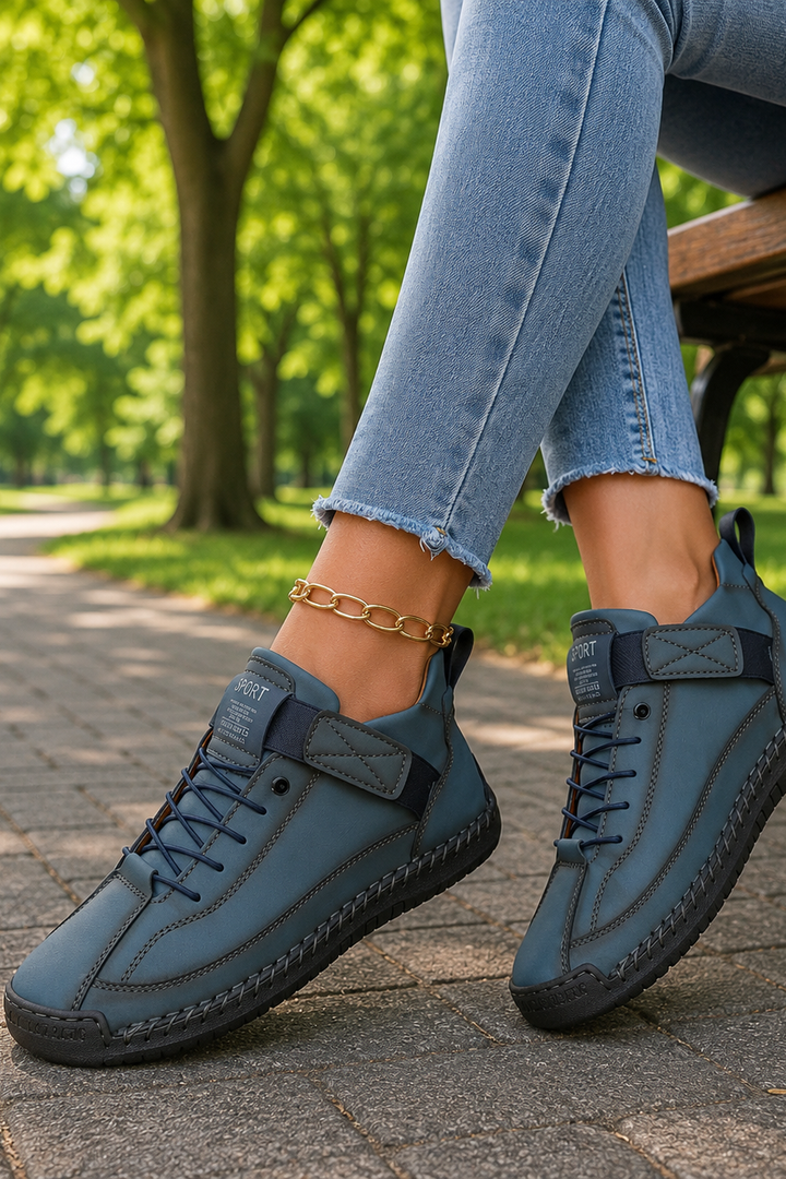 Close-up of breathable fabric on women's everyday casual sneakers, promoting comfort & style.