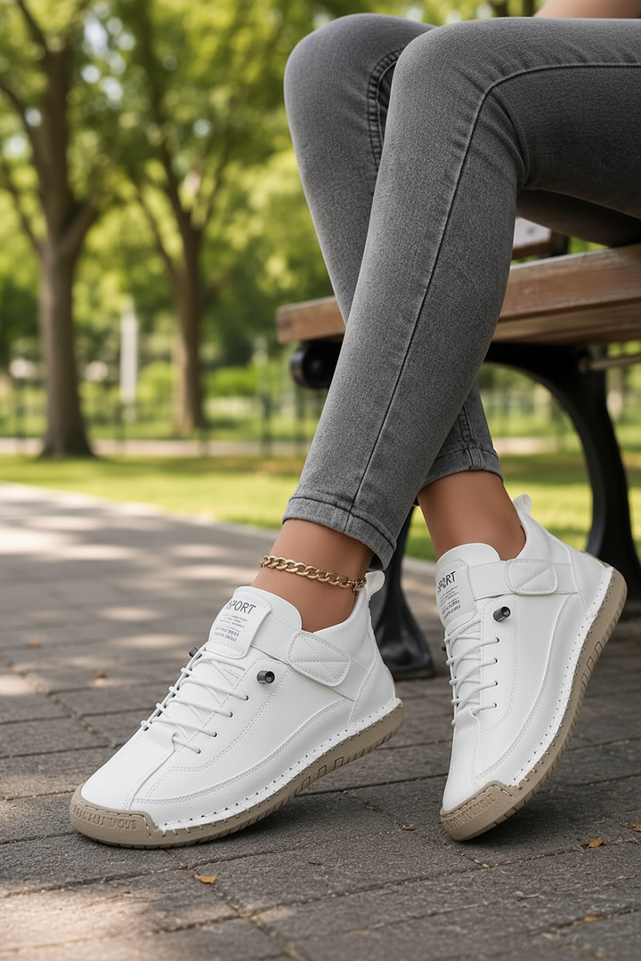 Detail of secure laces on women's lightweight sneakers, ensuring everyday comfort & support.