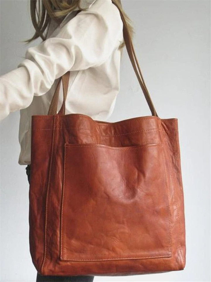 Eco-friendly women's vegan leather tote bag, durable and chic for the conscious fashionista.