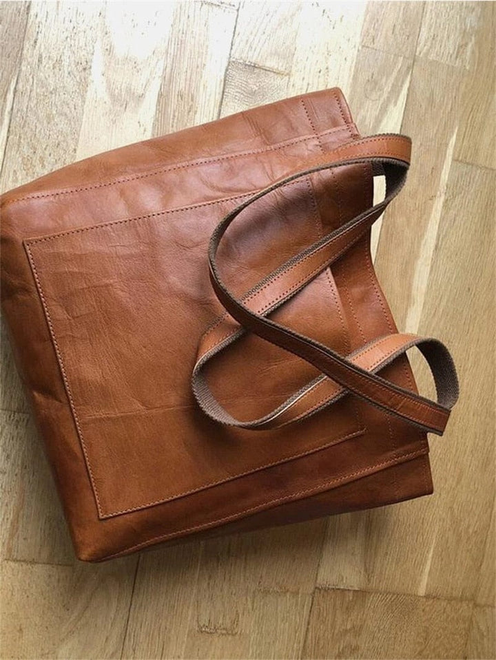 Versatile everyday vegan leather tote, functions as a shoulder bag or handbag for women on the go.