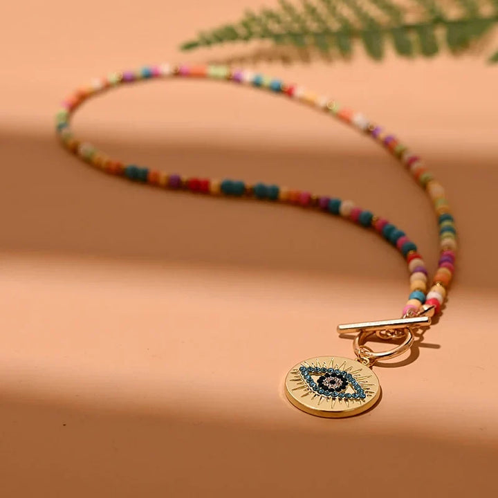 Women's Evil Eye Pearl Choker Necklace, elegant and protective fashion jewelry accessory.