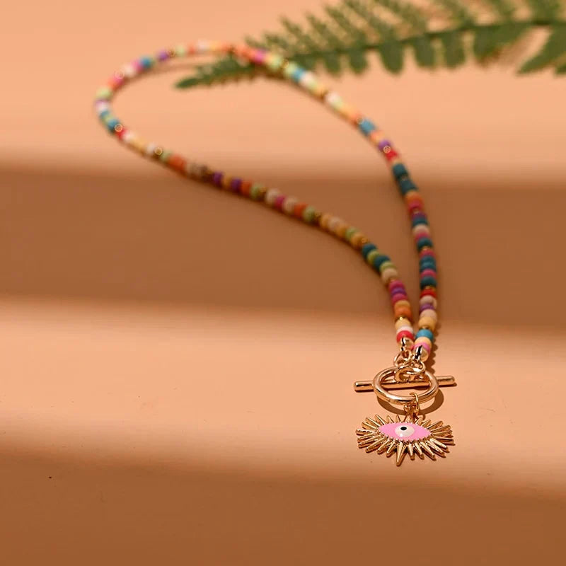 Elegant women's evil eye pearl choker necklace, a spiritual protection jewelry piece for her.