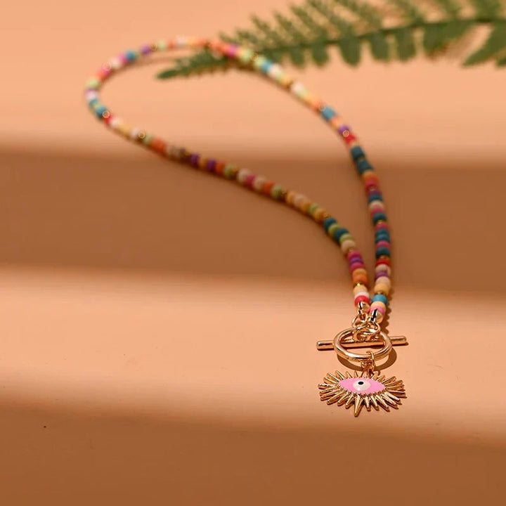 Elegant women's evil eye pearl choker necklace, a spiritual protection jewelry piece for her.