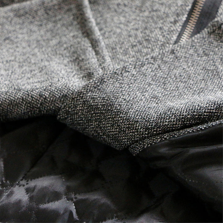 Women's extra warm long winter coat with protective hood, providing full-length coverage for cold.