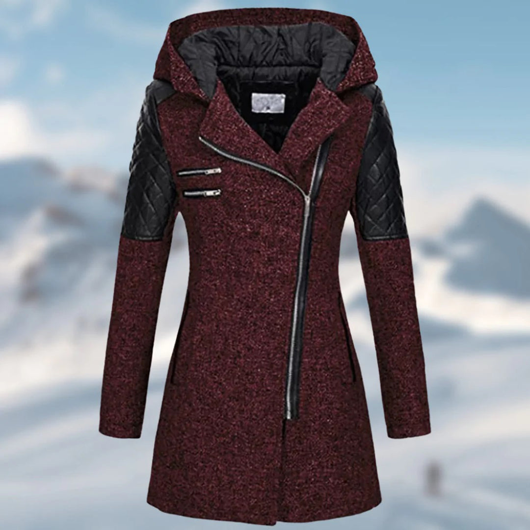 Stylish women's long winter coat featuring a protective hooded design, perfect for icy winds.