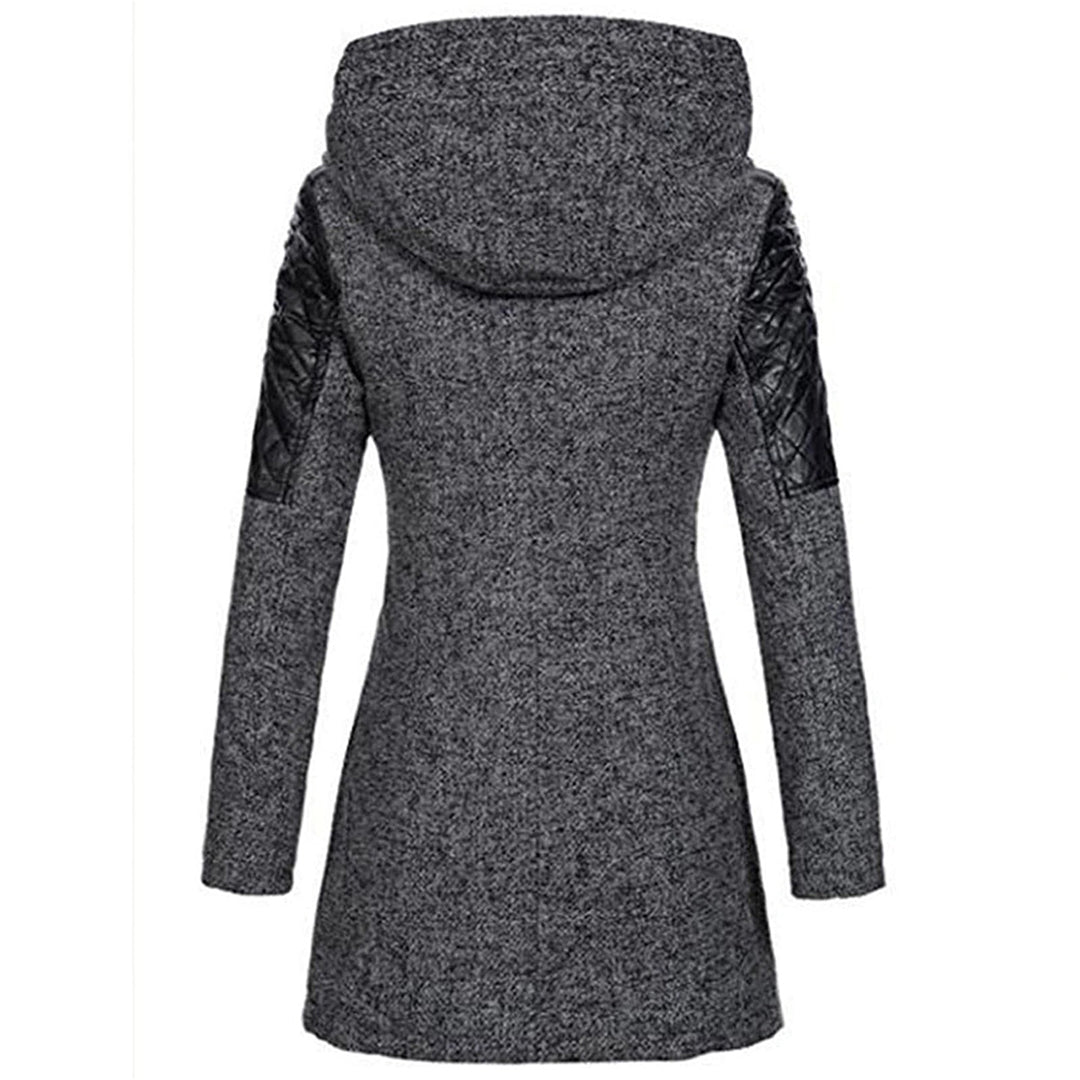 Fashionable women's long hooded winter coat, combining style and warmth for chilly days.
