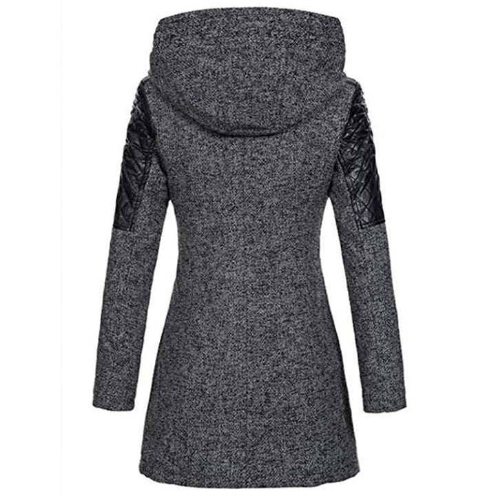 Fashionable women's long hooded winter coat, combining style and warmth for chilly days.