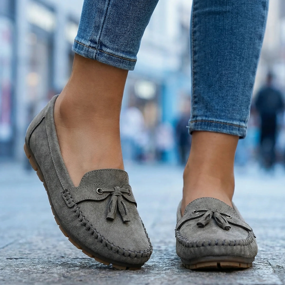 Slip-on women's extra wide loafers featuring plush memory foam for superior all-day comfort.
