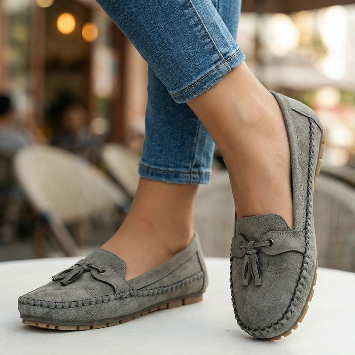 Navy blue women's extra wide memory foam loafers, offering comfort and support for long days.