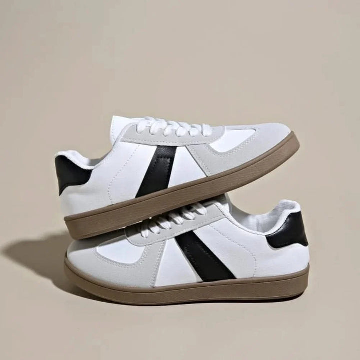 Athletic comfort women's sneakers, offering a blend of modern fashion and superb support for daily wear.