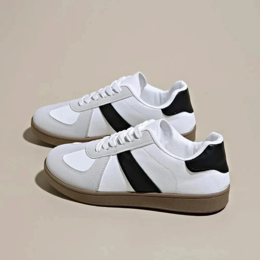 Elegant women's comfort shoes, featuring a modern sneaker design for fashionable and versatile everyday style.
