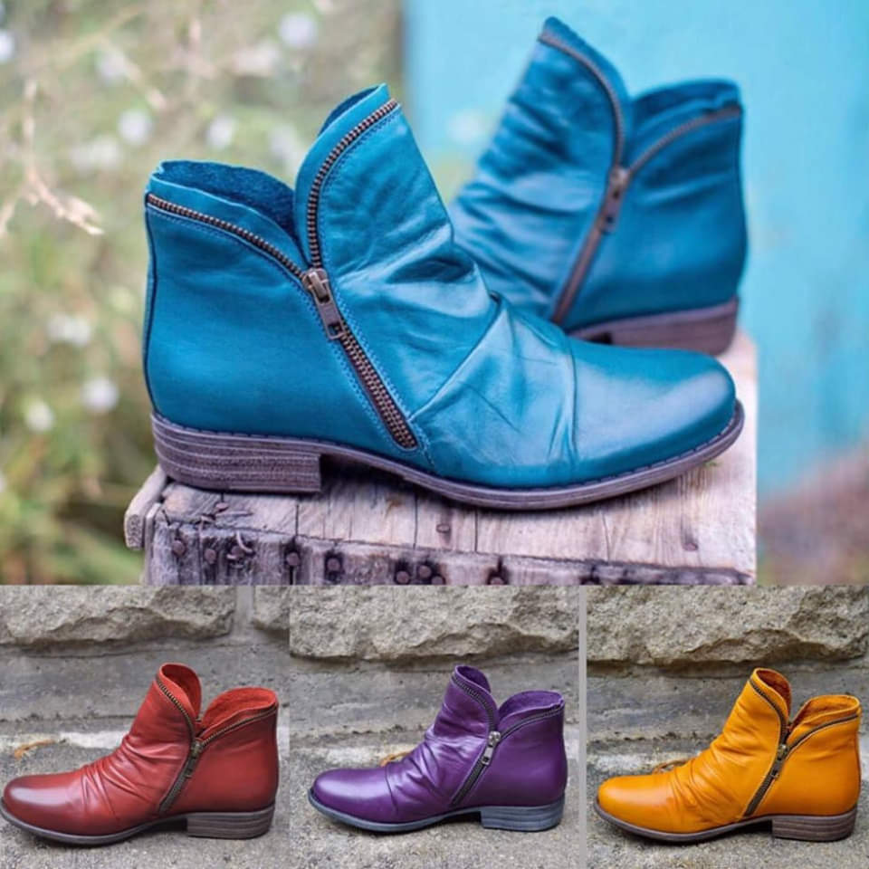 Women's fashionable black ankle boots with side zipper, perfect for stylish comfort on cold winter days.