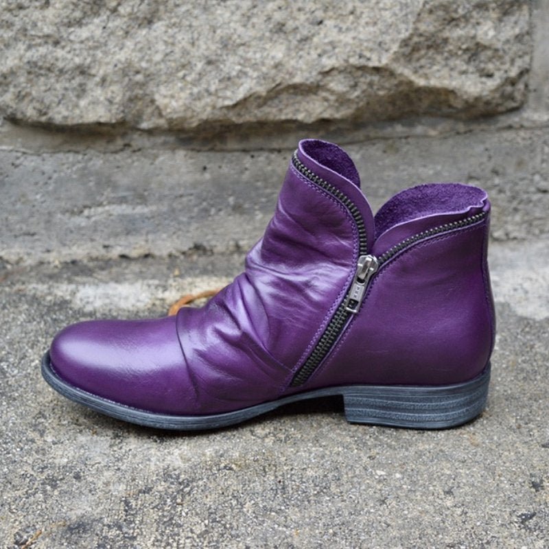 Fashionable women's ankle boots for cold days. Comfortable, warm & supportive footwear with zipper detail.