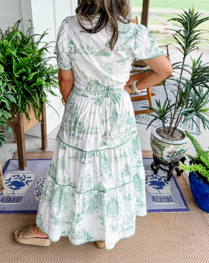 Women's Felicity Classic Toile Maxi Dress. Elegant V-neck, smocked waist, and flowing tiered skirt for comfort.