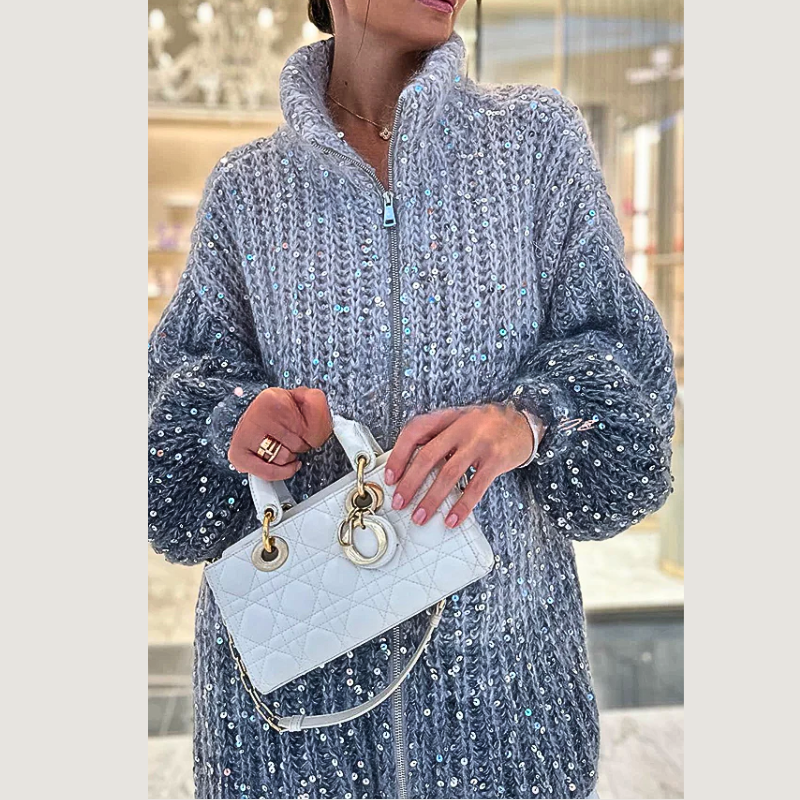 Glamorous women's sequin knit cardigan. Festive long-sleeve sweater, a sparkling top for elegant party wear.