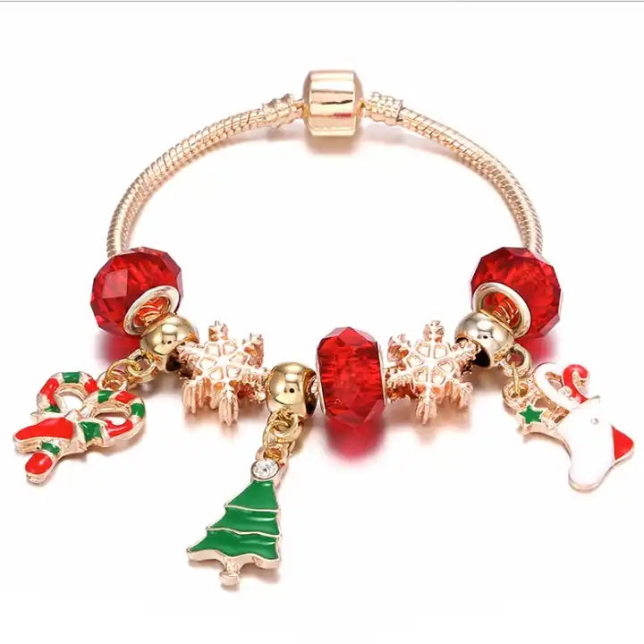 Festive women's Christmas charm bracelet featuring sweet candy cane, reindeer, and Christmas tree charms. Holiday gift.