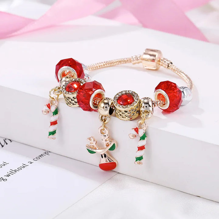 Unique Christmas gift: women's festive candy cane charm bracelet with assorted holiday charms. Perfect jewelry accessory.