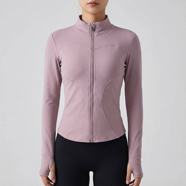 Close-up of a women's black fitness jacket, stretch fabric, full zip detail