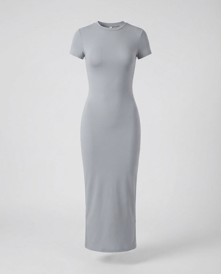 Versatile women's fitted maxi dress with crew neck & short sleeves. Ideal casual or evening bodycon style.