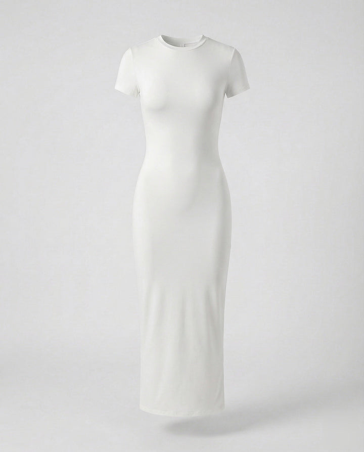 Model poses in women's crew neck bodycon maxi dress, showcasing its elegant silhouette and short sleeves.