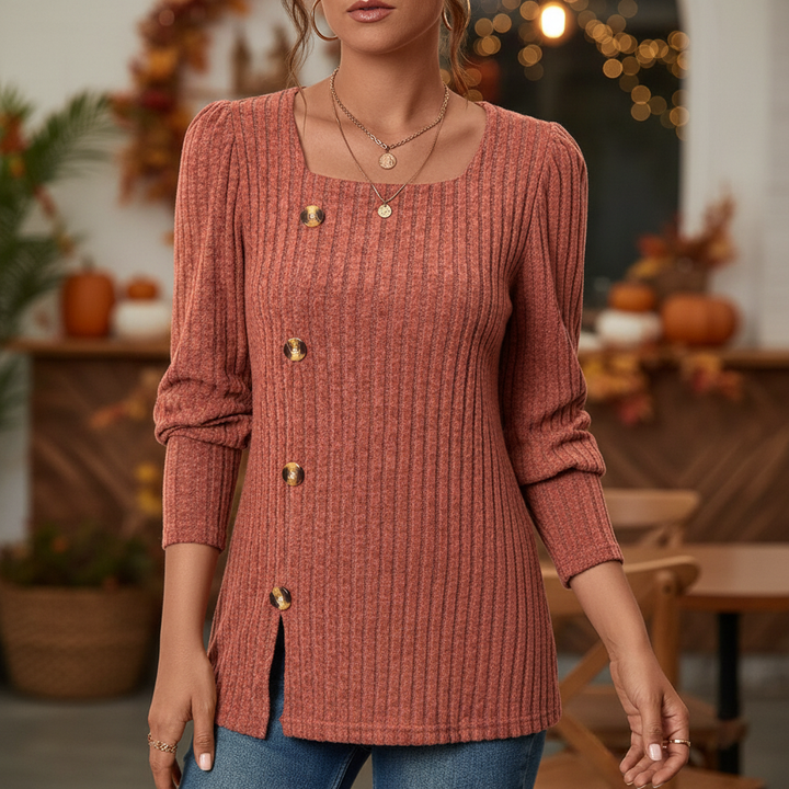 Women's fitted ribbed knit long sleeve top in a versatile cotton blend, perfect for casual autumn outfits.