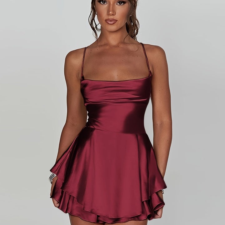 Flattering women's fitted mini party dress with ruched details & tiered layers.