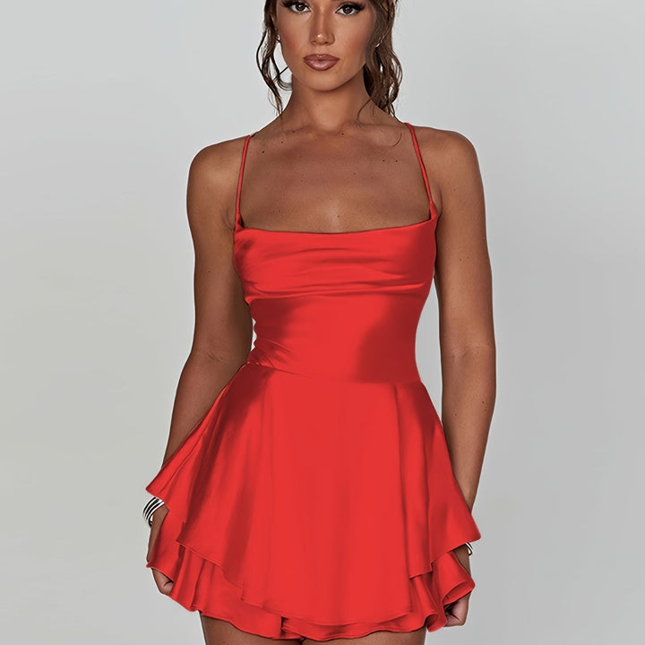 Fitted women's dance dress, ruched top, playful tiered mini skirt, adjustable straps.