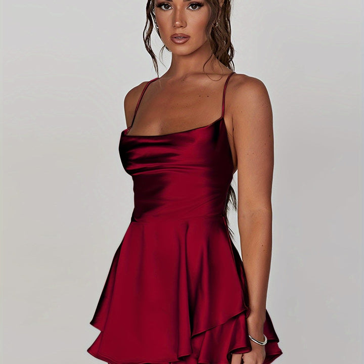 Chic women's formal mini dress with ruched bodice & tiered skirt.