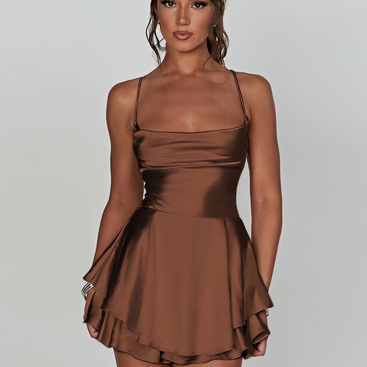 Women's fitted mini party dress, ruched top, tiered skirt, perfect for dancing.