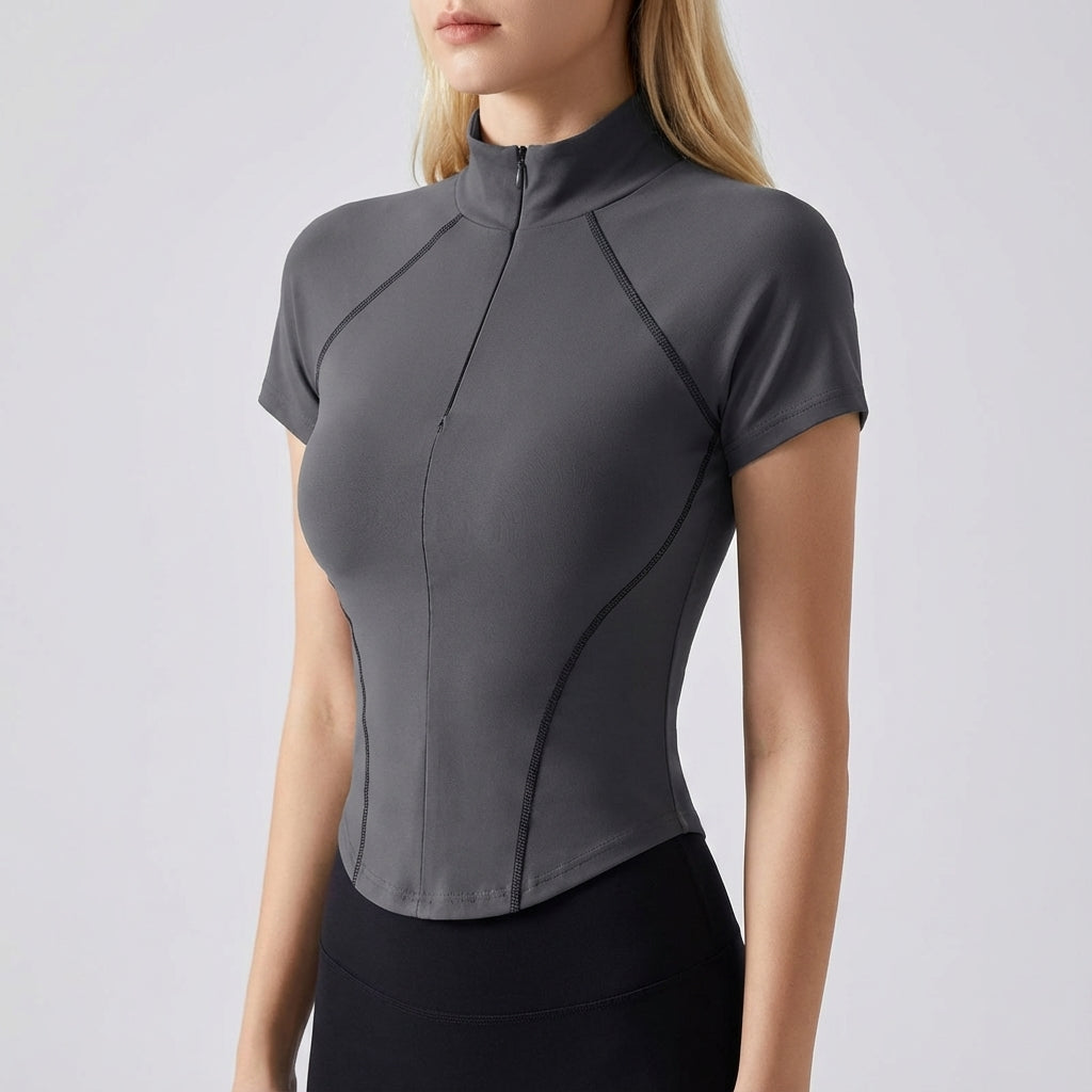 Close-up of a women's short sleeve fitted stretch training top in blue, perfect for activewear