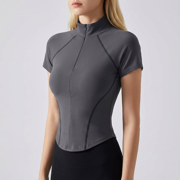 Close-up of a women's short sleeve fitted stretch training top in blue, perfect for activewear