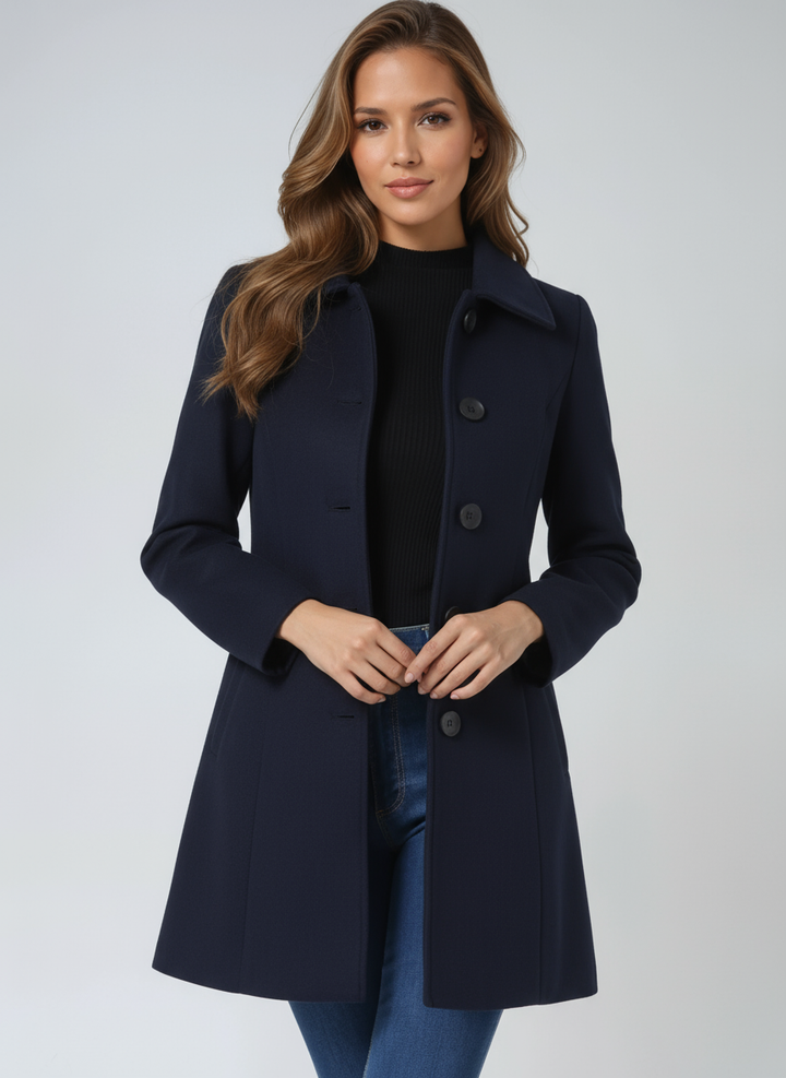 Woman wearing a fitted trenchcoat, professional & elegant with button closure, perfect for office fashion workwear.