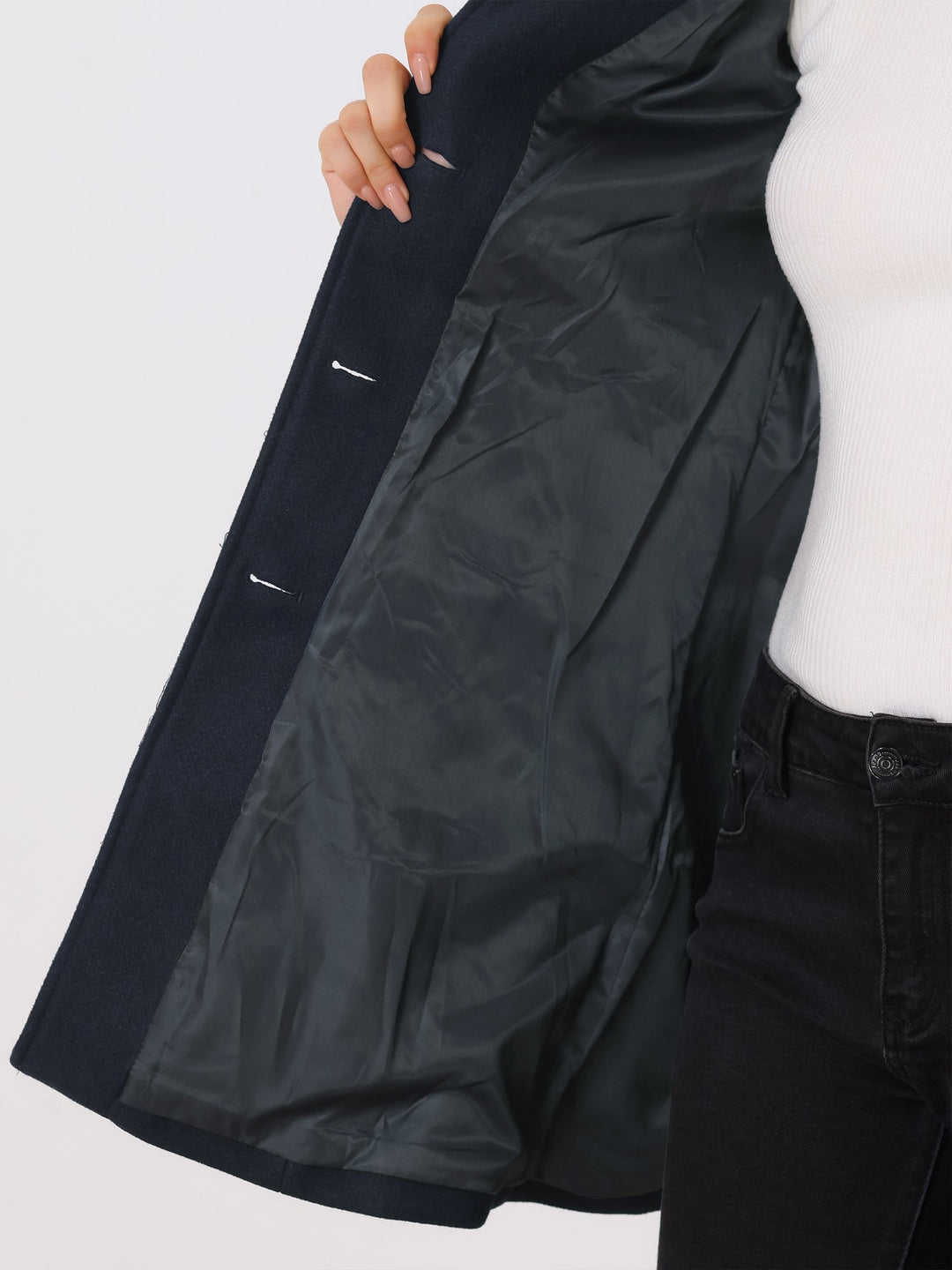 Timeless women's fitted trenchcoat, a professional long sleeve jacket with button closure for elegant workwear.