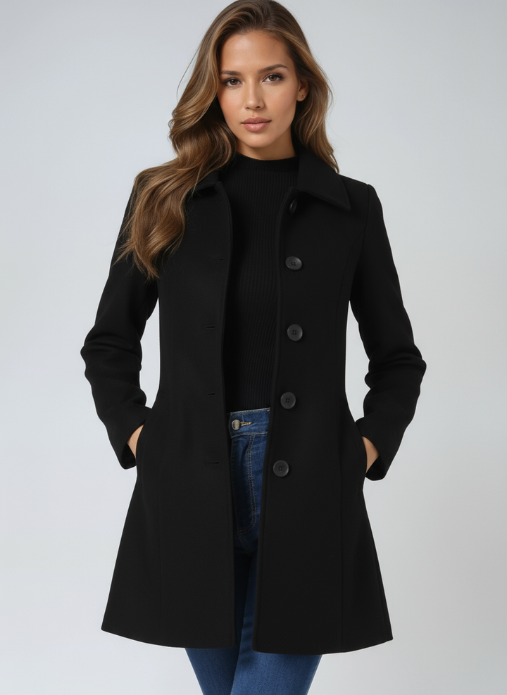 Professional women's trenchcoat featuring elegant button closure, long sleeve & fitted silhouette for office fashion.