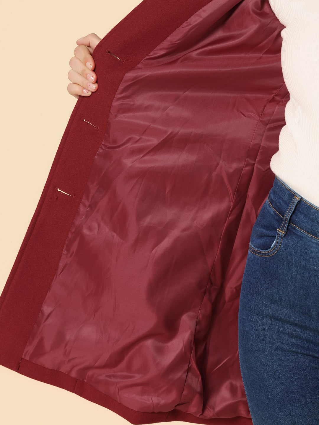 Women's fitted trenchcoat, professional elegant outerwear with classic button closure & structured design.
