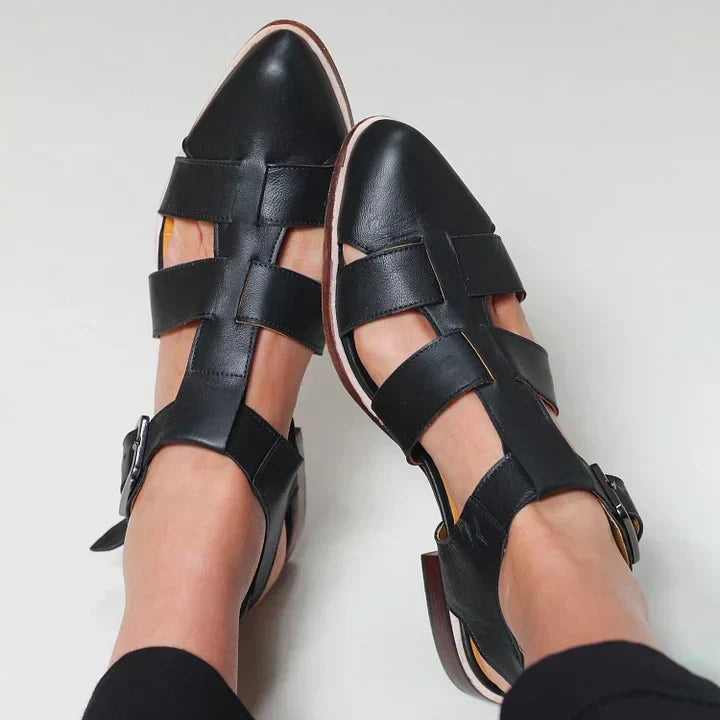 Comfortable women's flat sandals featuring adjustable woven straps, ideal for everyday casual summer wear.