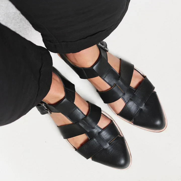 Stylish women's woven strap flat sandals, a versatile casual footwear choice for daily summer comfort.
