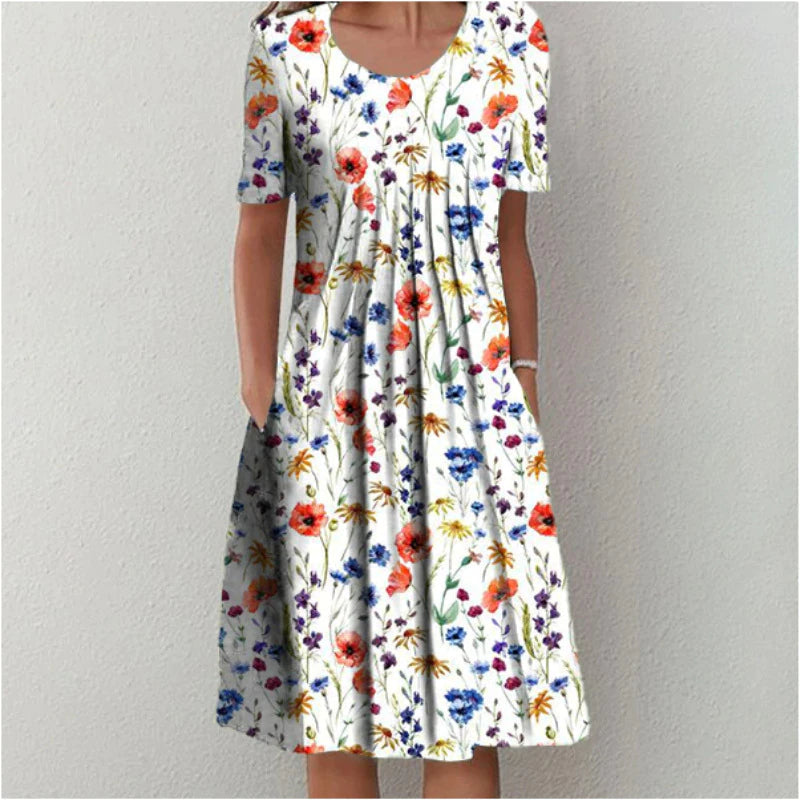 Women's flattering A-line dress with tummy control for comfortable everyday wear. Perfect casual floral spring/summer style.