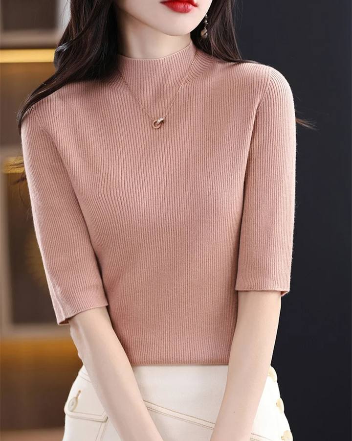 Stylish women's fashion: comfortable long sleeve ribbed knit top for modern women.