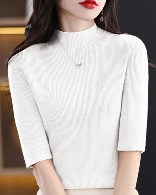 Textured ribbed knit women's top, long sleeve, perfect for a refined casual style.