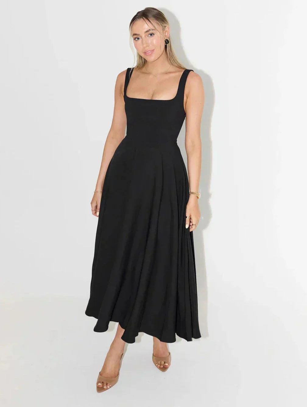 Women's elegant square neck midi dress, flattering fit for any event or casual look.