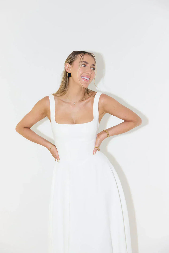 Flattering women's midi dress with a chic square neck, comfortable and stylish.