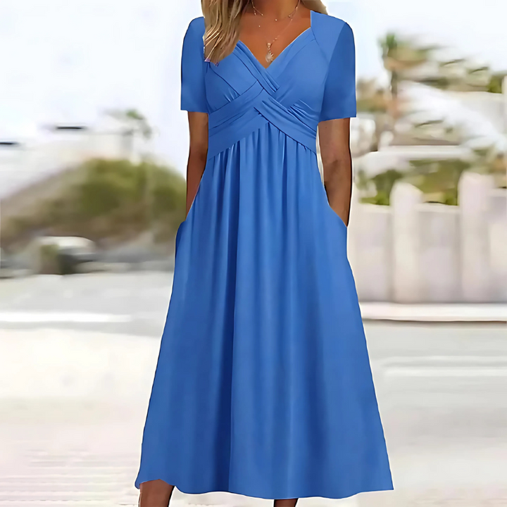 Casual chic Leia midi dress, A-line V-neck with pockets. Perfect for women's summer parties or everyday elegance.